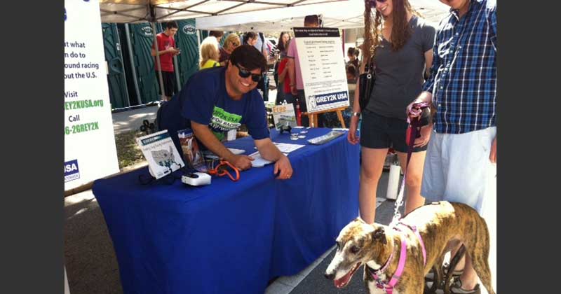 Bryan Wilson of Florida collects signatures for a petition.